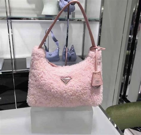 prada bag accessories|fluffy Prada shoulder bag.